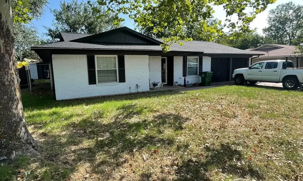 Professional roofing crew working on a residential roof in Union